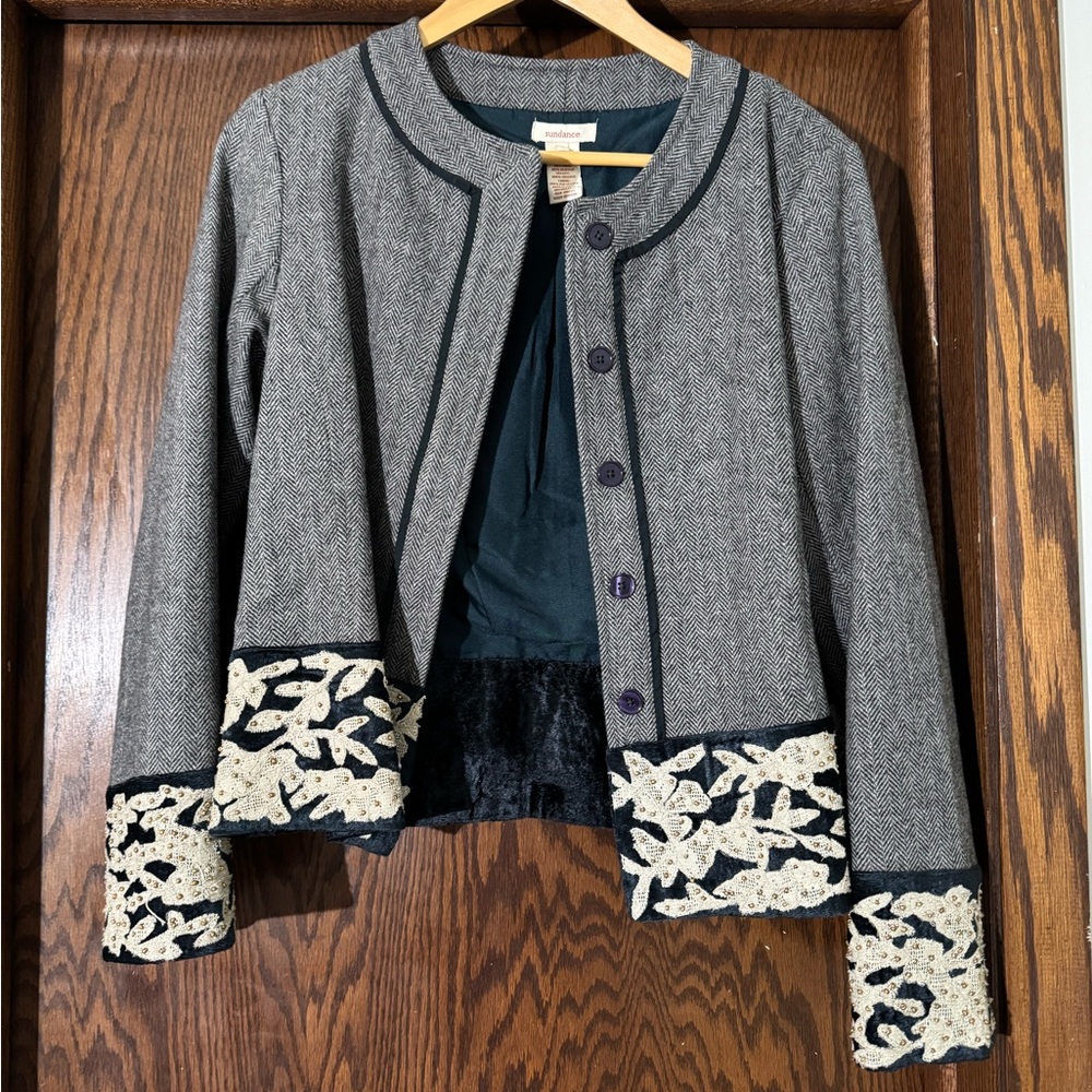 This is a beautiful Sundance jacket.  It is so detailed and so femjnjne